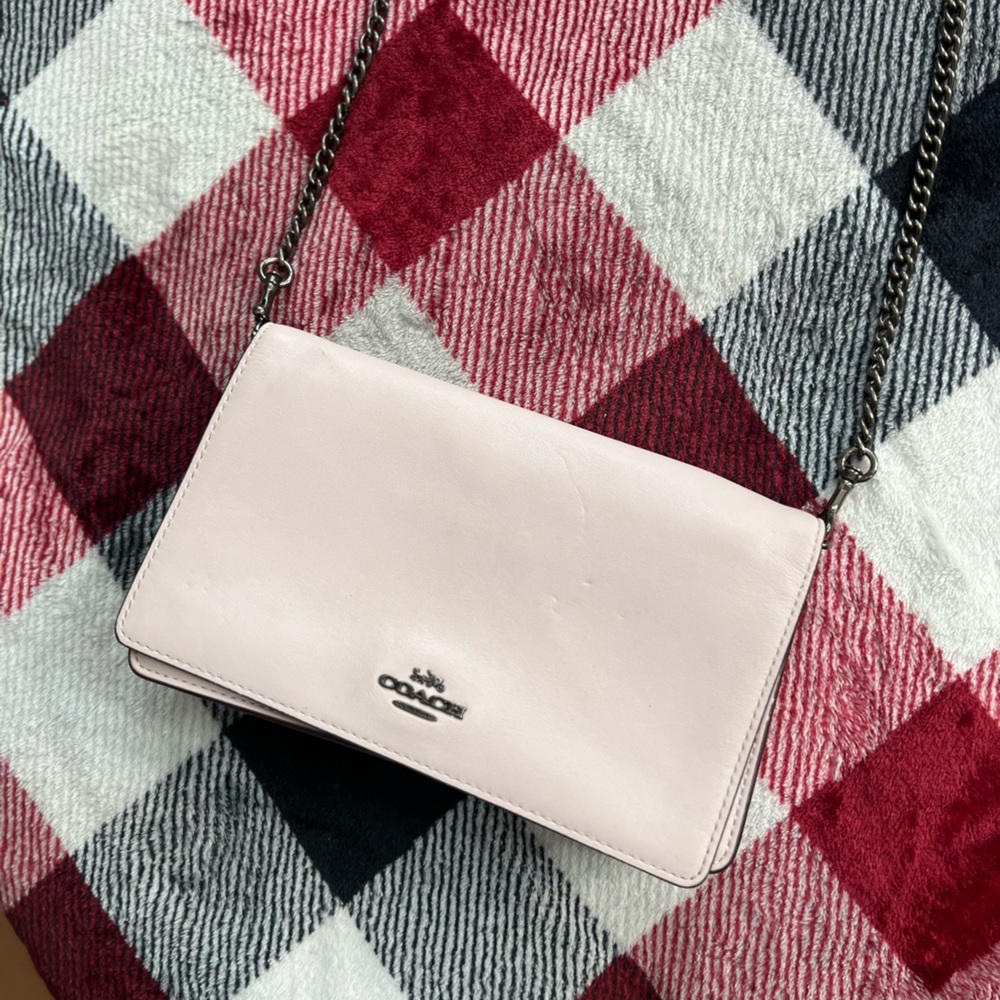Coach purse, soft pink color with fun chain purse strap.